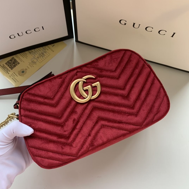 G*u*i clutch bags